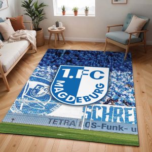 1. FC Magdeburg Magdeburger Fans feiern ihre Mannschaft Teppich
