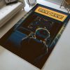Kind spielt Pacman-Spiel Teppich
