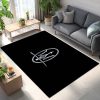 Maserati Symbol Black Background Teppich